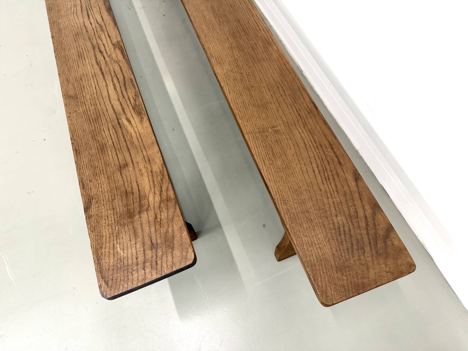 Pair of solid oak benches, winged legs, France, 1970s