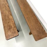 Pair of solid oak benches, winged legs, France, 1970s