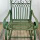 Rocking-chair en fer forgé vert patiné