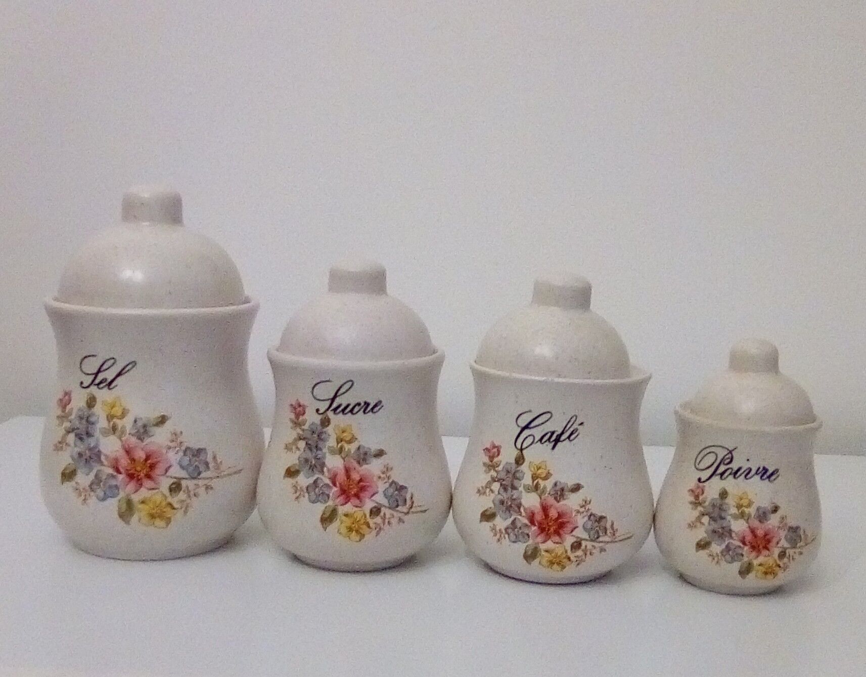 Series of 4 kitchen pots - floral motif