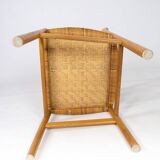 A set of four dining room chairs in oak and seat in papercord, designed by Børge Mogensen