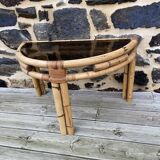 Console / coffee table in rattan and tempered glass.