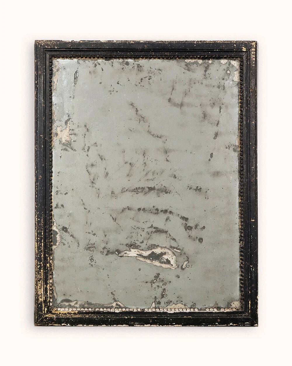Antique French mirror from the late 19th century with a black painted frame.