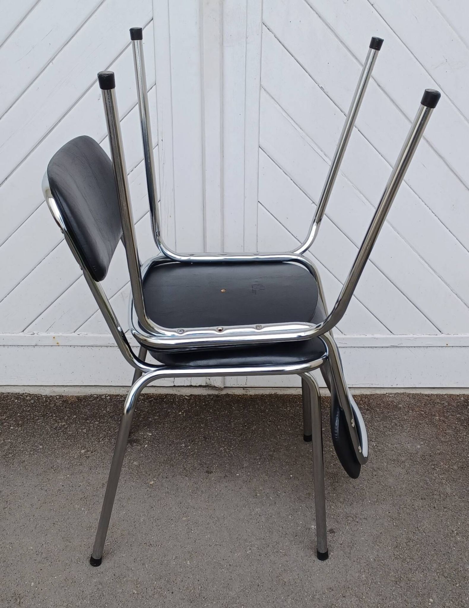 Pair of vintage faux leather and chrome chairs
