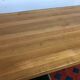 Solid oak table with extension cords