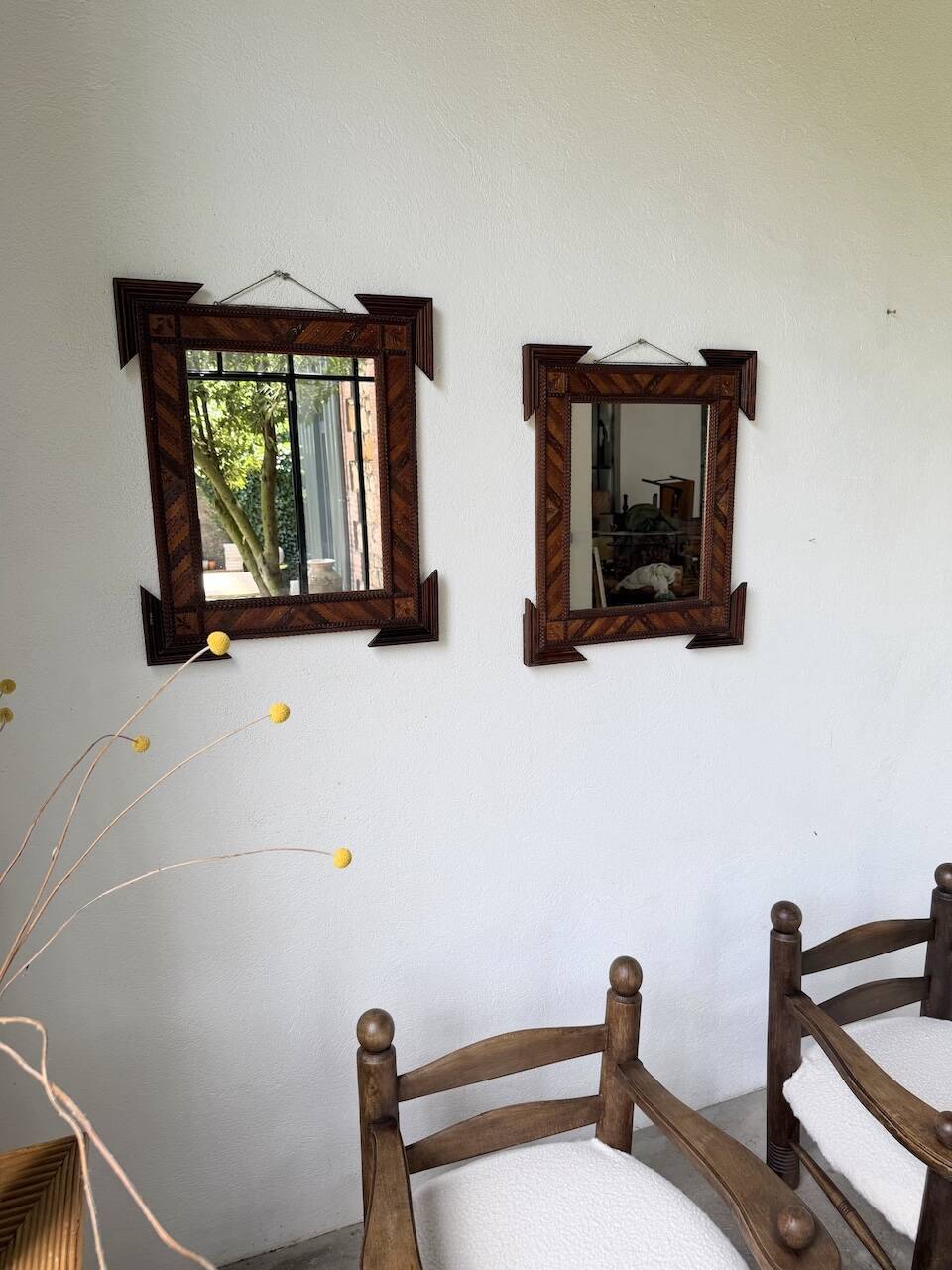Pair of wooden mirrors in tramp art style