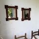 Pair of wooden mirrors in tramp art style