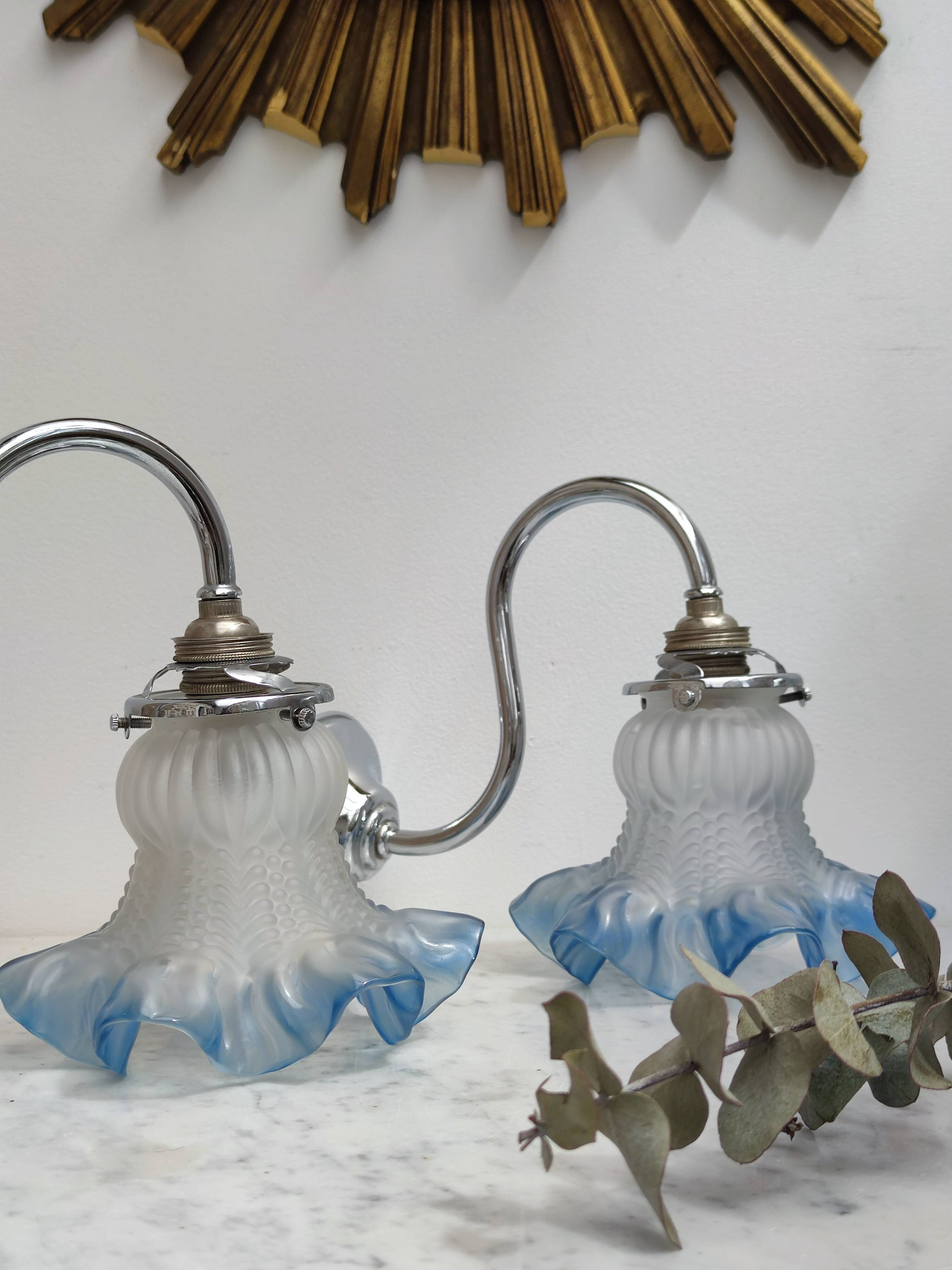 2 blue swan collar sconces