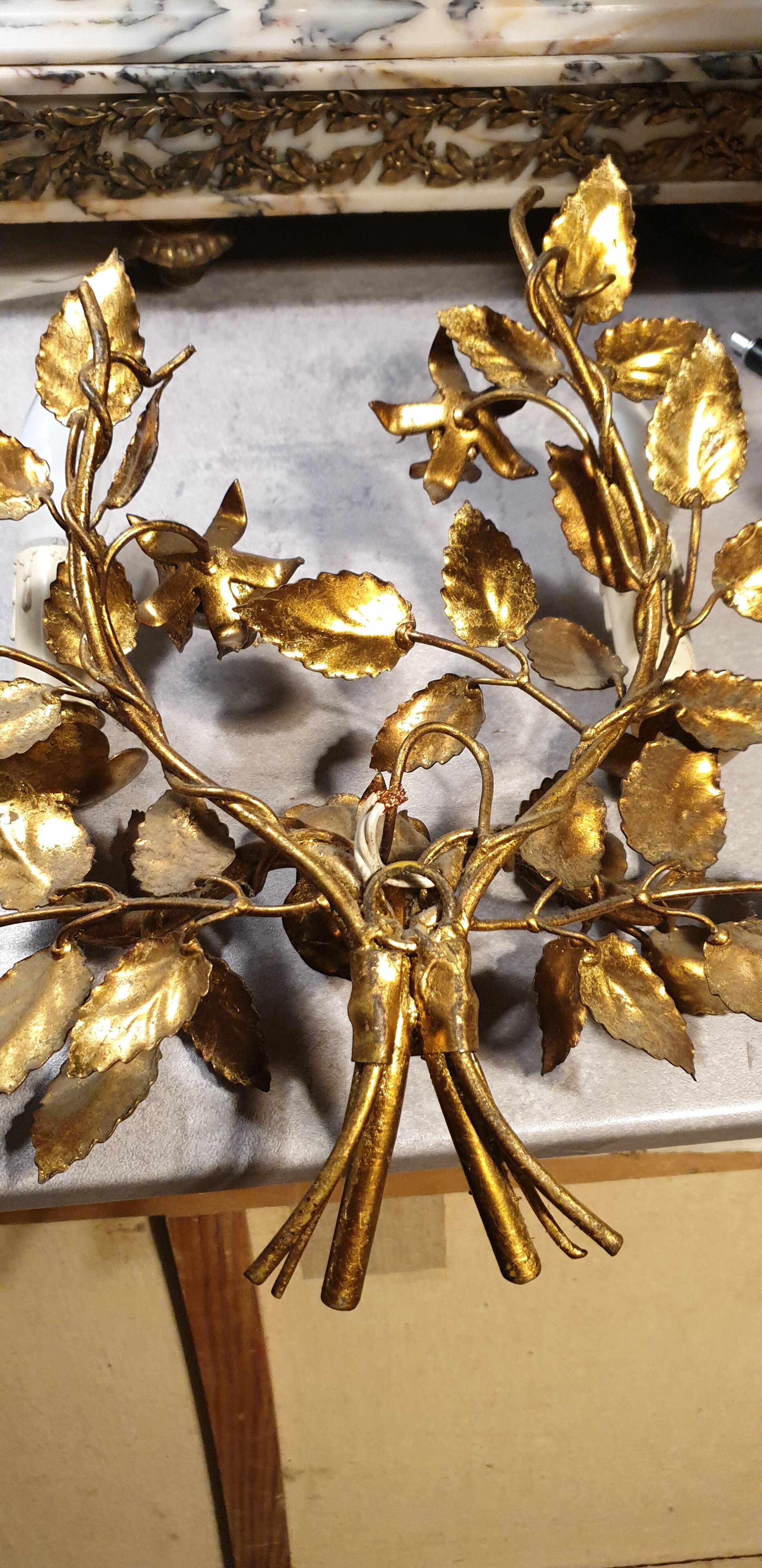 Pair of gold metal wall lights