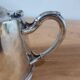 Vintage silver-plated metal teapot, pottery style