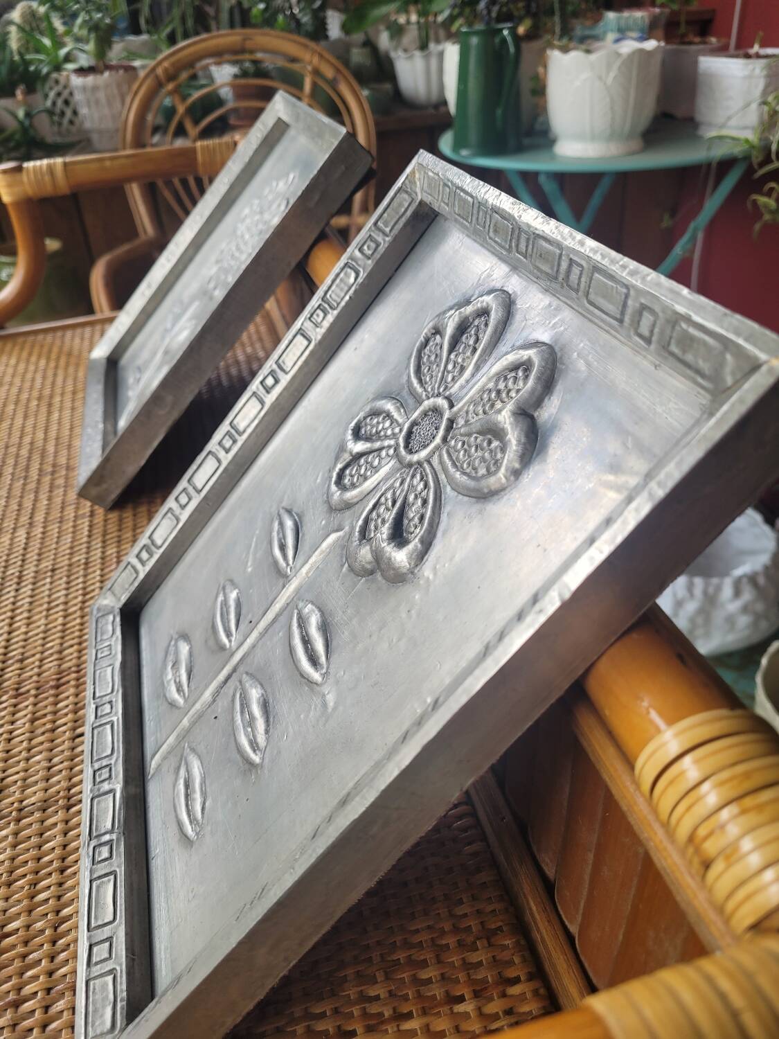 Pair of embossed flower paintings