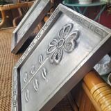 Pair of embossed flower paintings