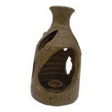 Stoneware candle holder.