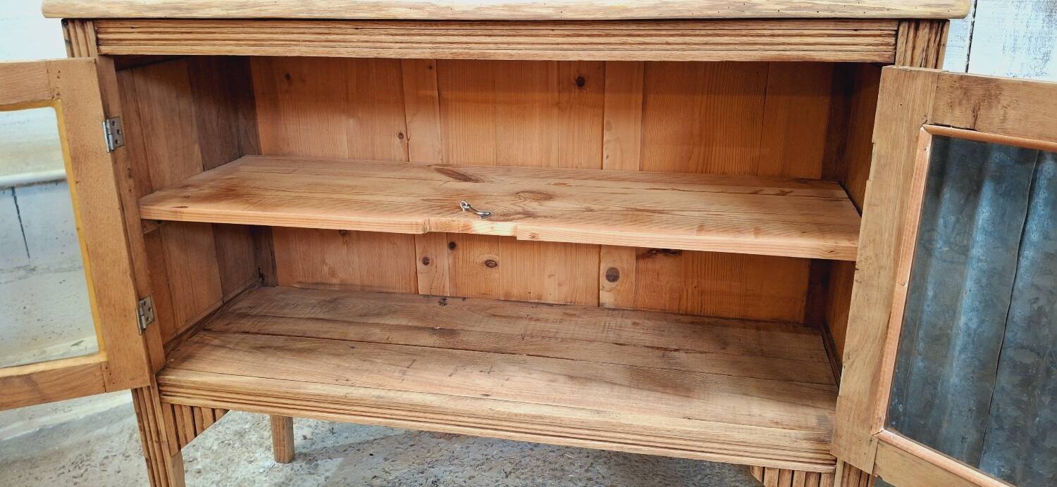 Old glass sideboard on legs