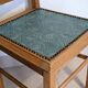 Revisited antique chair in solid wood with a sage green seat.