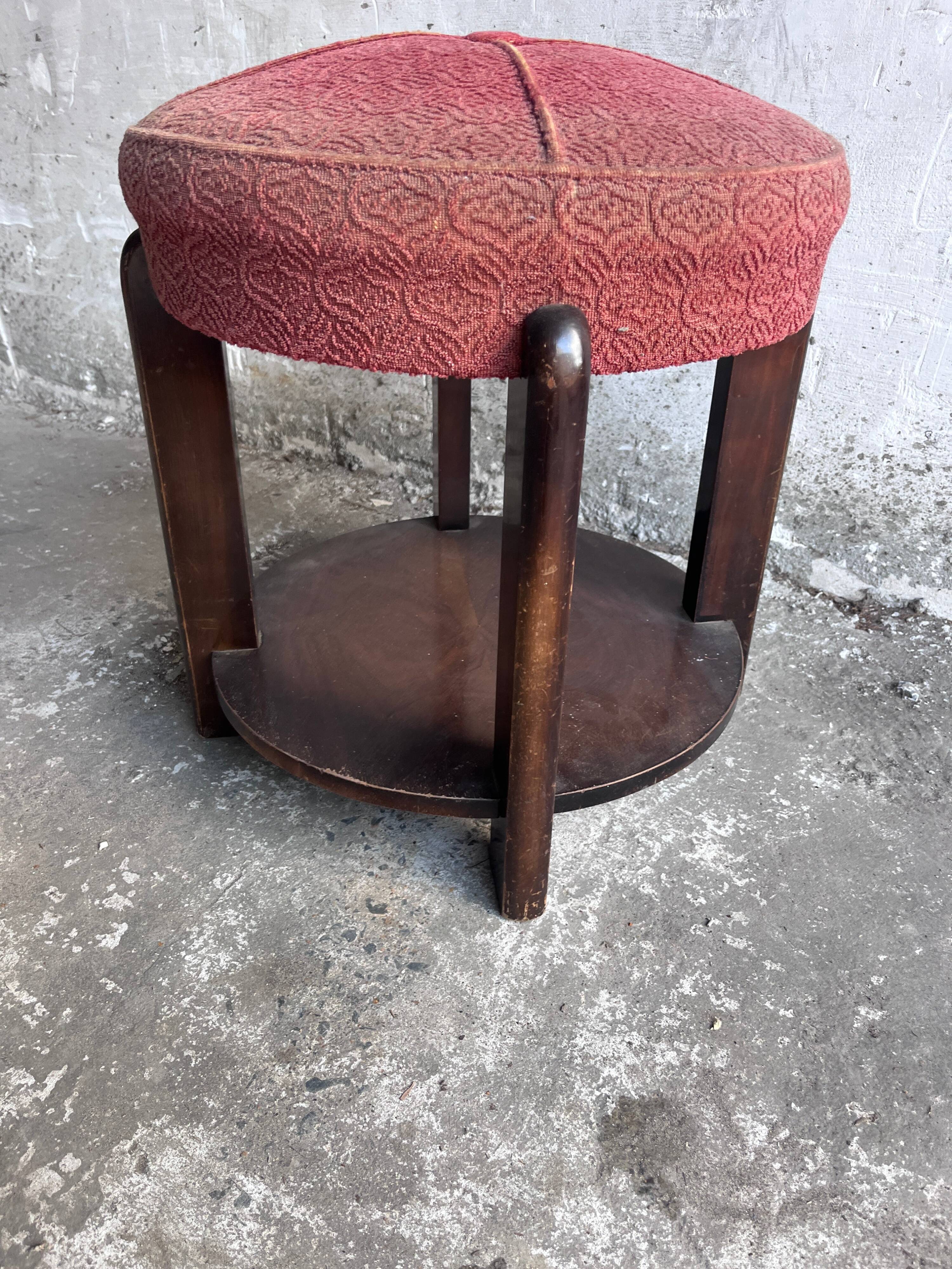 Art Deco stool upholstered with a lower shelf, France, circa 1930.
