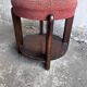 Art Deco stool upholstered with a lower shelf, France, circa 1930.