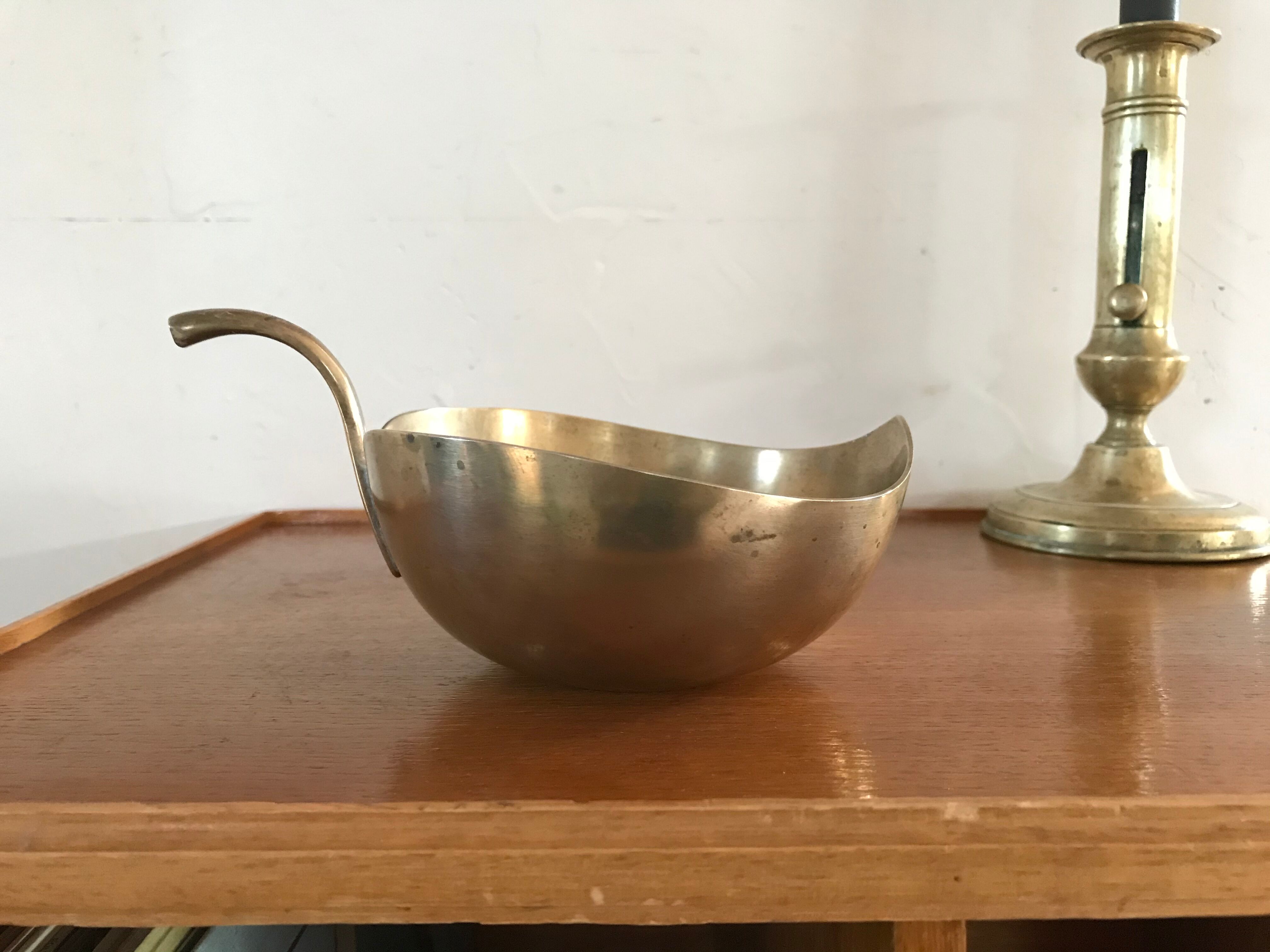 Empty brass apple pocket