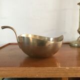 Empty brass apple pocket