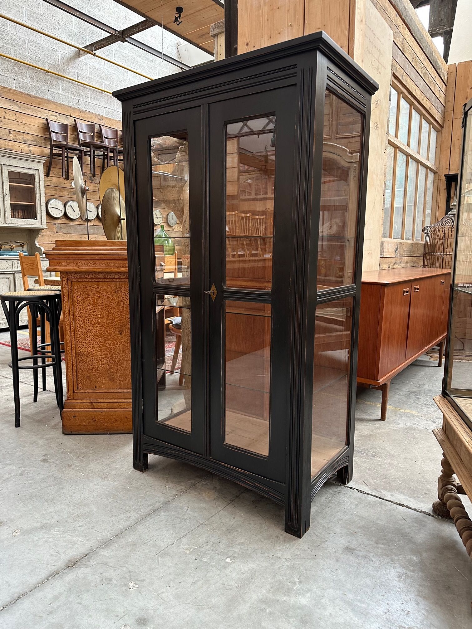 Patinated showcase early twentieth century