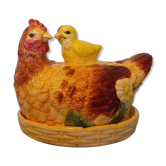 Empty pocket in the shape of a painted ceramic hen
