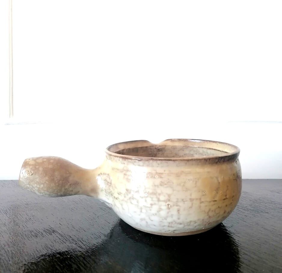 Beige glazed terracotta caquelon