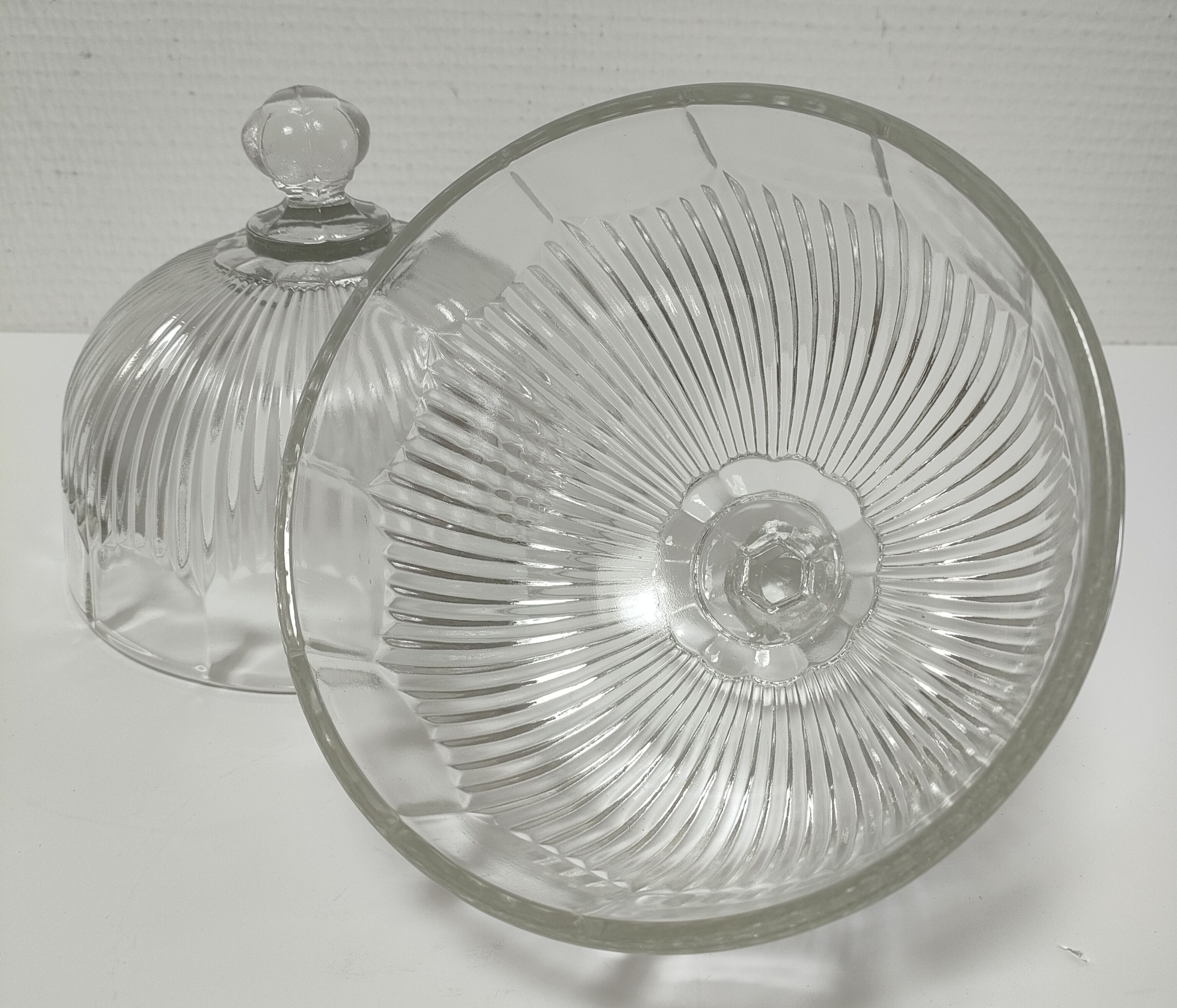Two cheese bells molded pressed glass striated Art Deco style early twentieth century