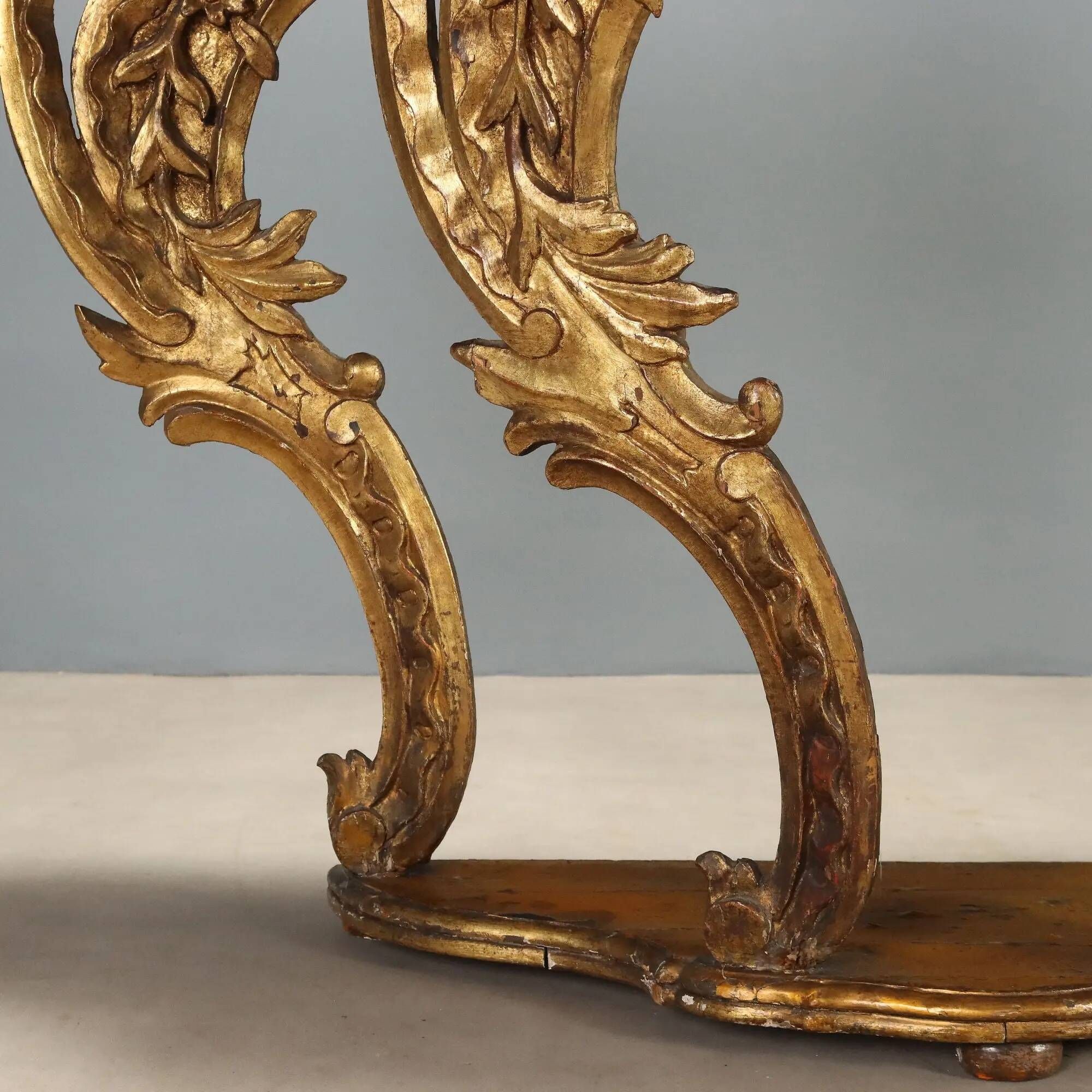Old eclectic console carved in gilded fir, Italy 19th century