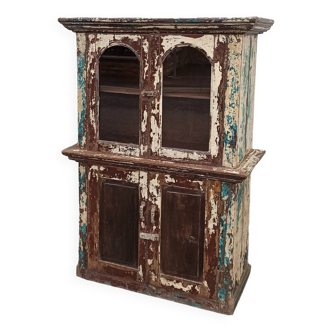 Old patinated wooden glass cabinet