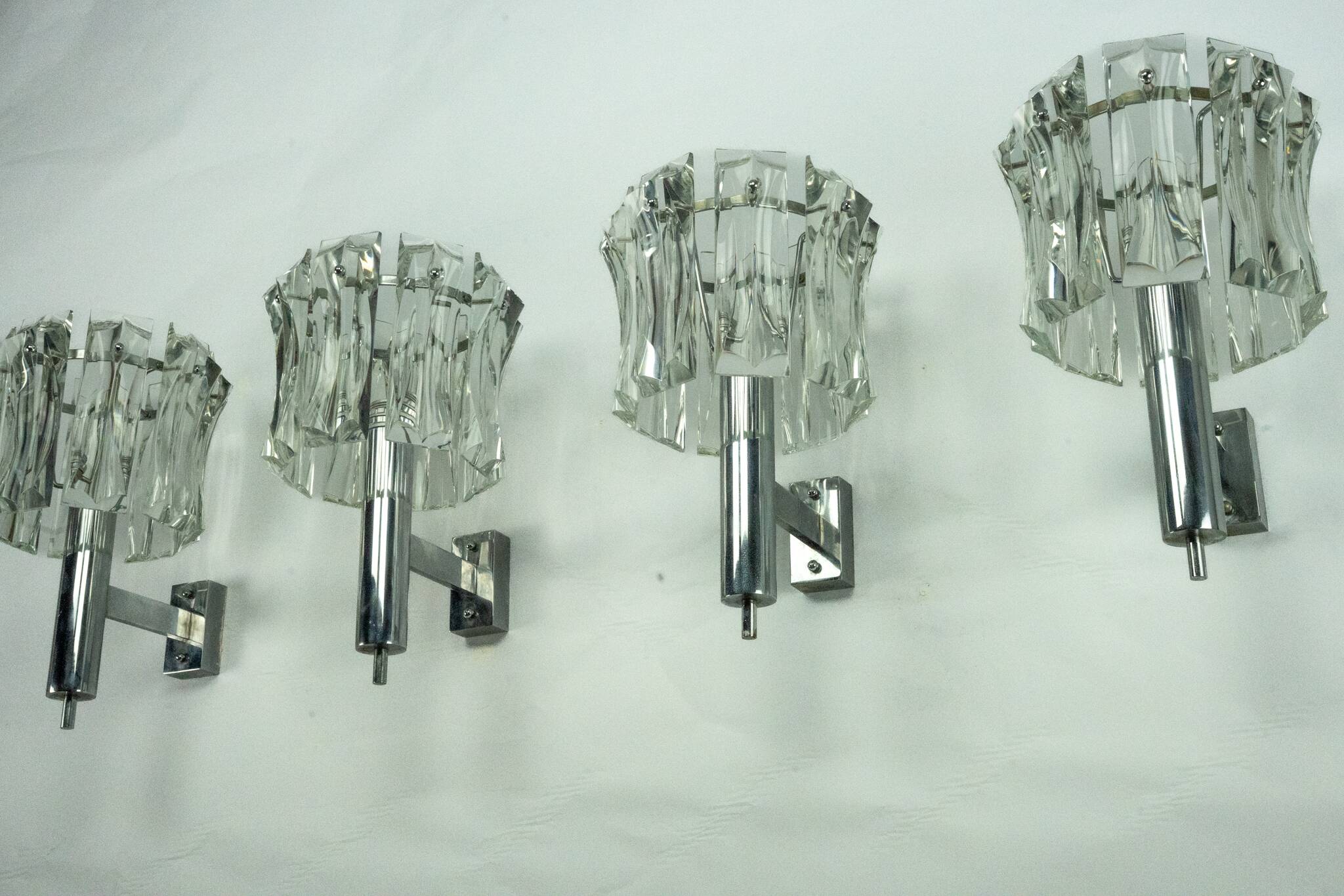Set of four large Murano glass elements and chromed brass sconces, Italy 60