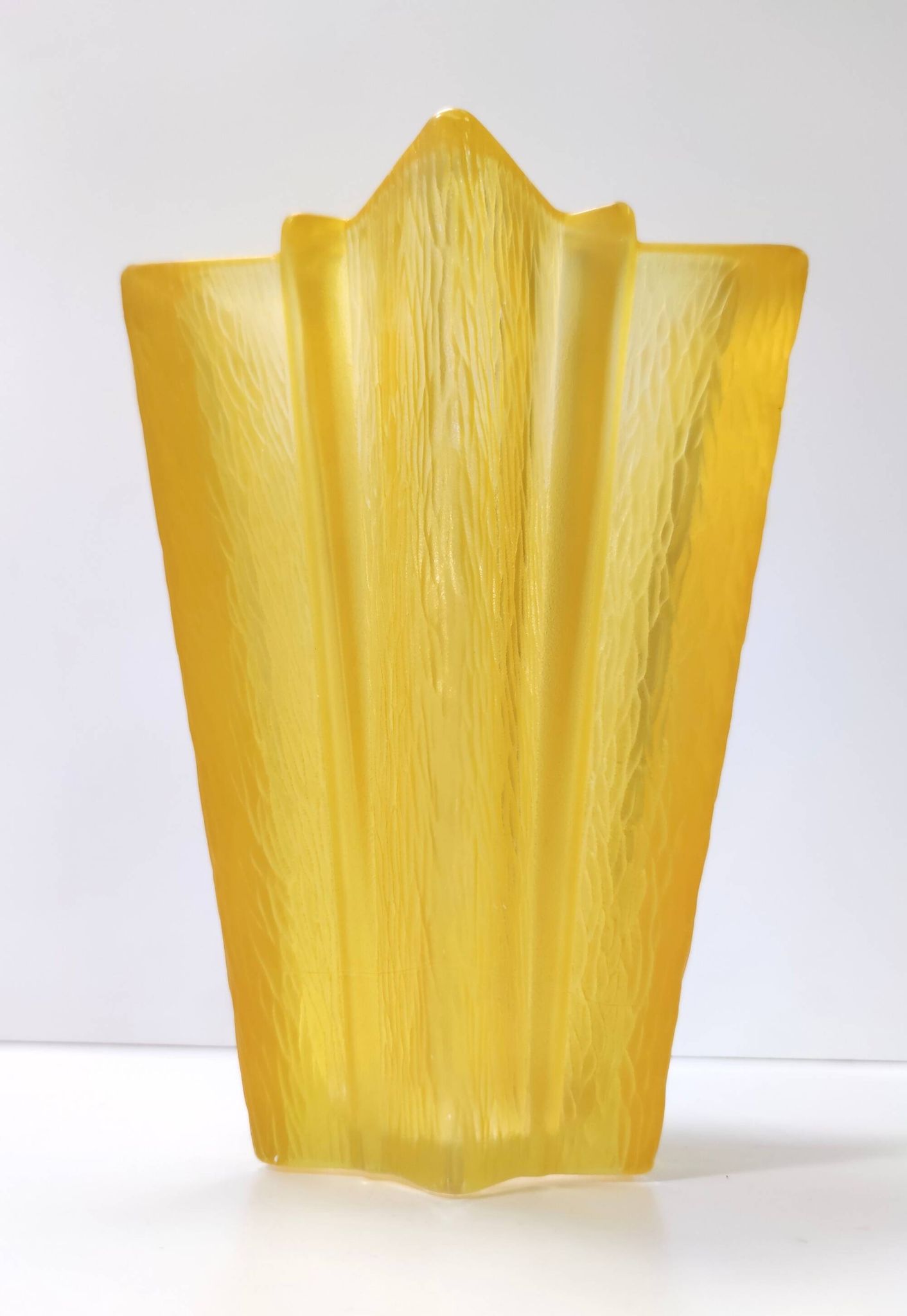 Art deco star shaped yellow glass vase attributed to pierre d'avesn for daum