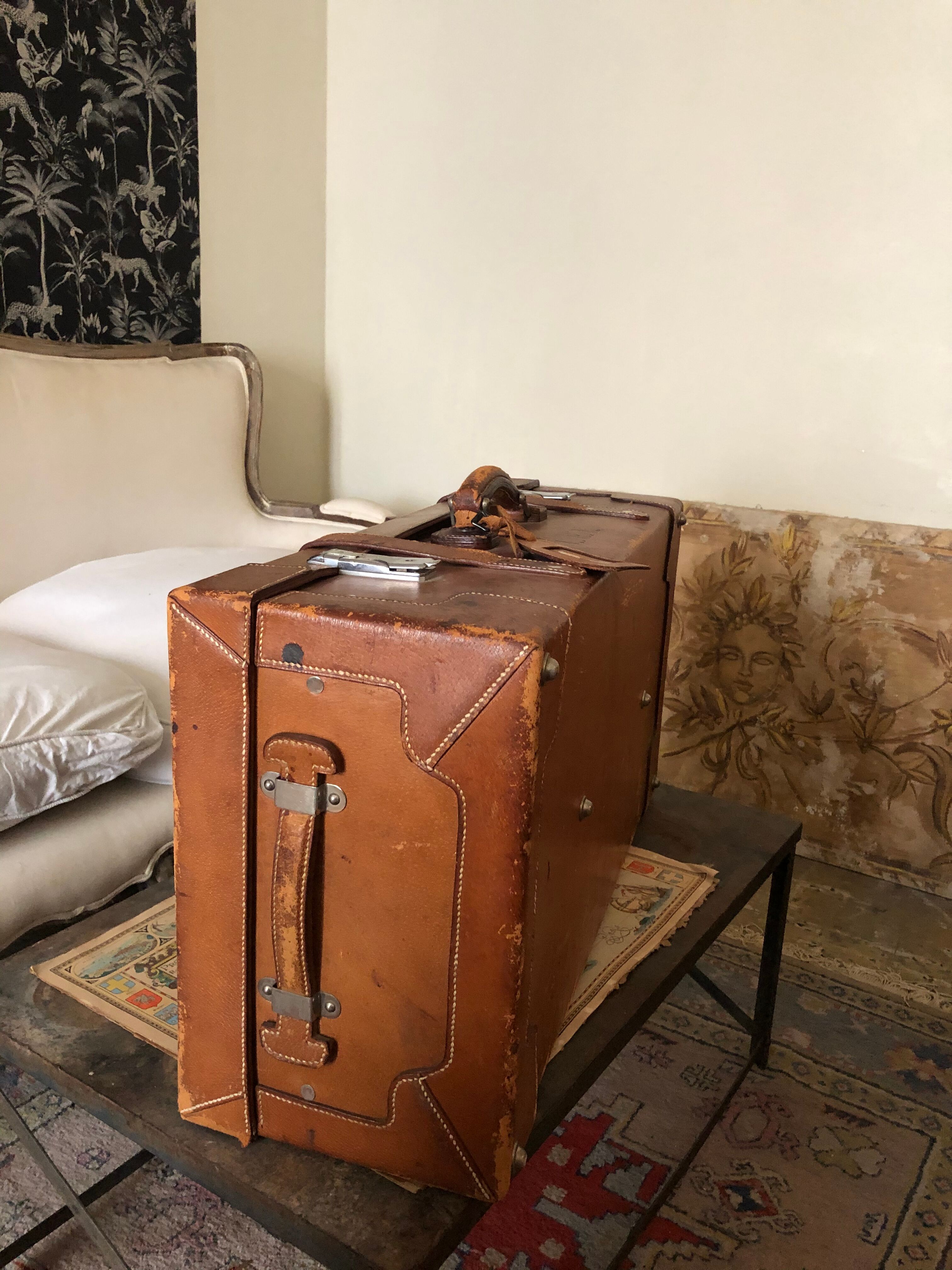 Former leather trunk with Louis Vuitton label holder