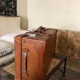 Former leather trunk with Louis Vuitton label holder