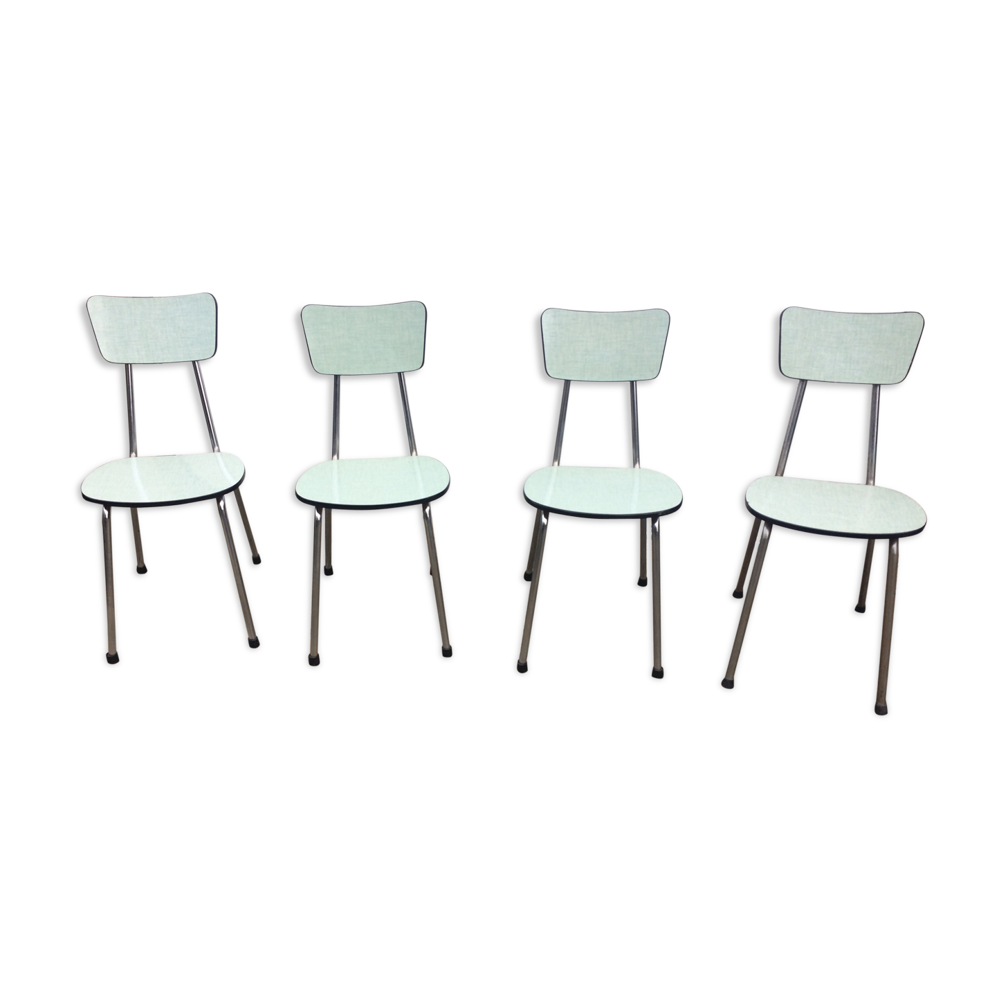 4 green formica chairs
