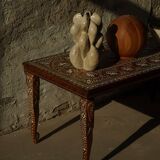 Vintage Indian teak coffee table inlaid with elephant motifs, mid-20th century.