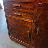 Vintage wooden display cabinet with yellow glass.