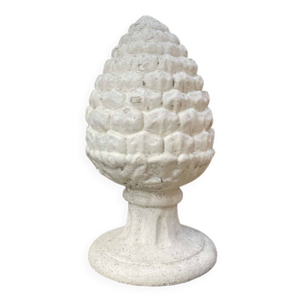 Reconstituted stone pine cone from the 1970s.