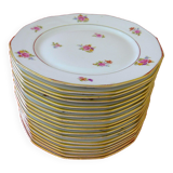 Suite of eighteen plates (18) of flat table in Limoges porcelain with floral decoration