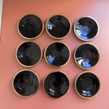 set of 9 black and gold Salins cups and saucers
