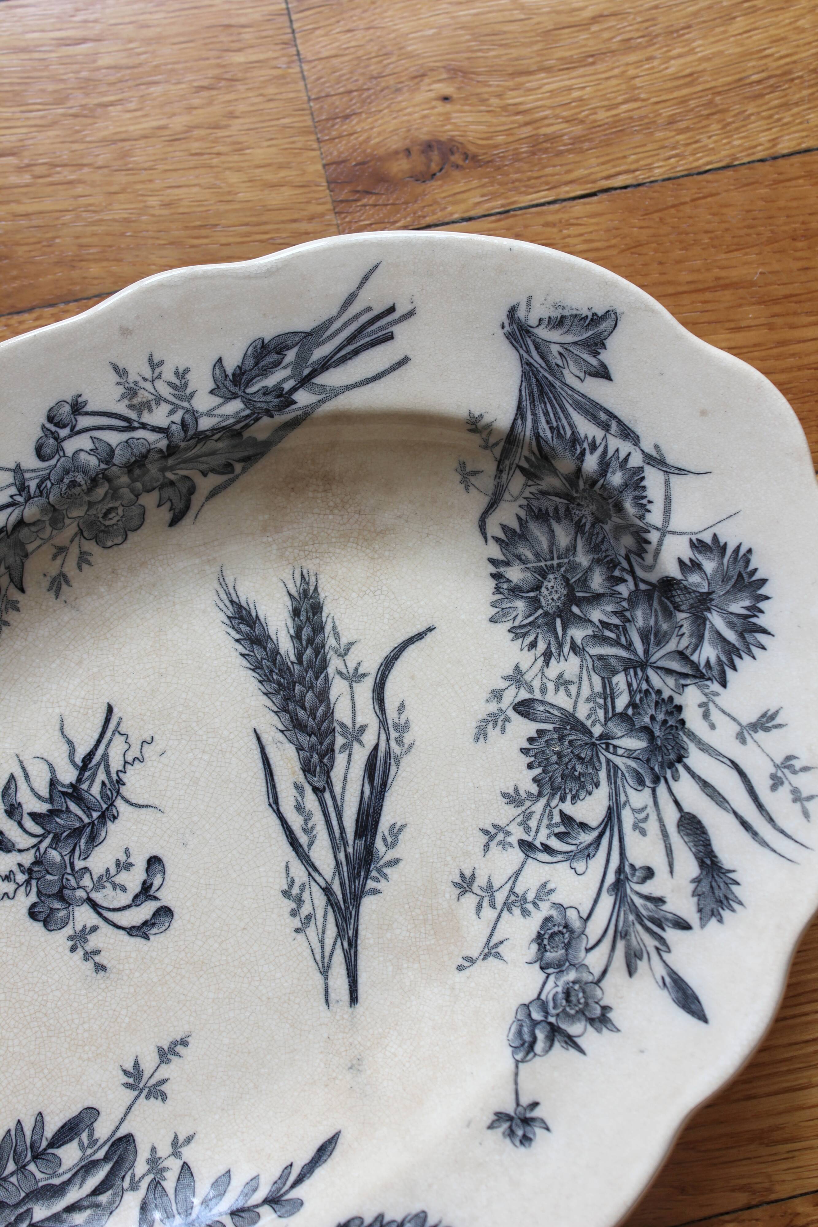 Oval ironstone dish with wheat and butterfly decoration, early 20th century