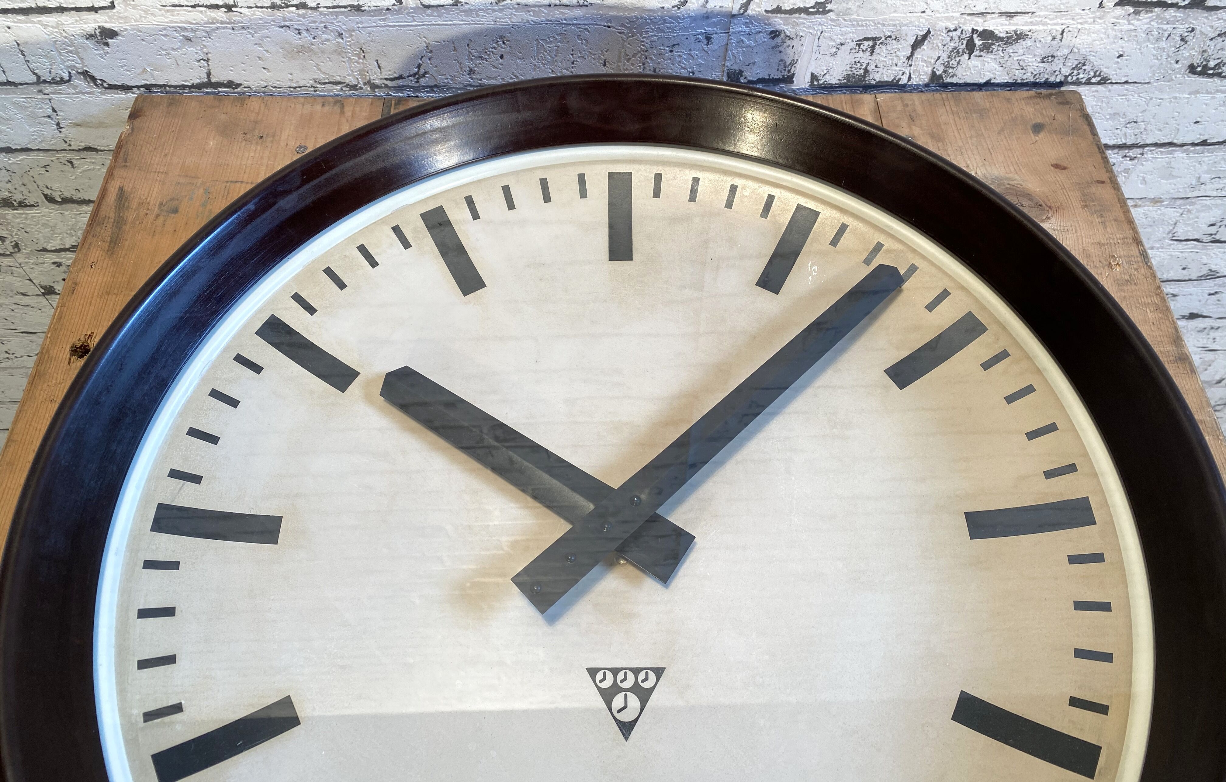 Industrial bakelite factory wall clock from Pragotron, 1960s