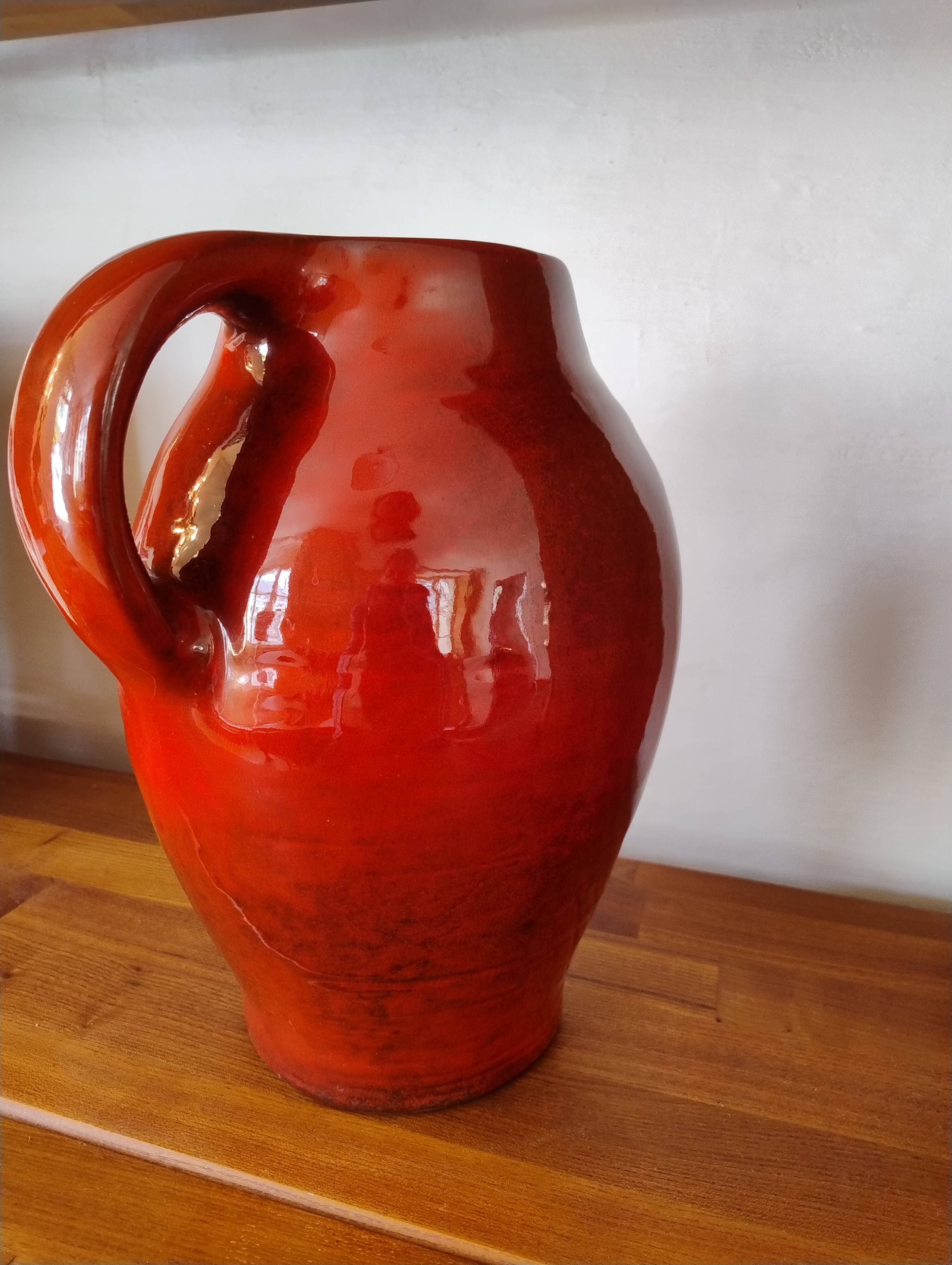 Large red jug or vase by Max Idlas
