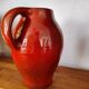 Large red jug or vase by Max Idlas