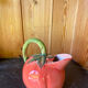Jug in tomato slipware