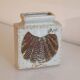 Scandinavian ceramic vase with stylised bird decoration.