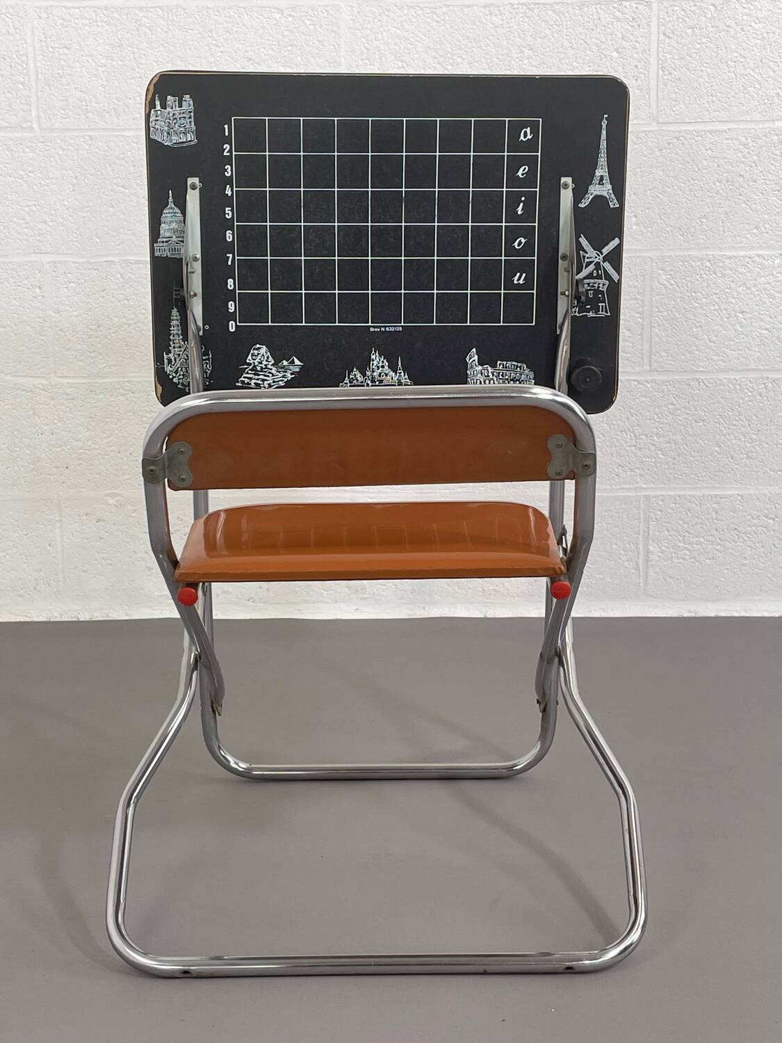 Vintage folding school desk with faux leather seat