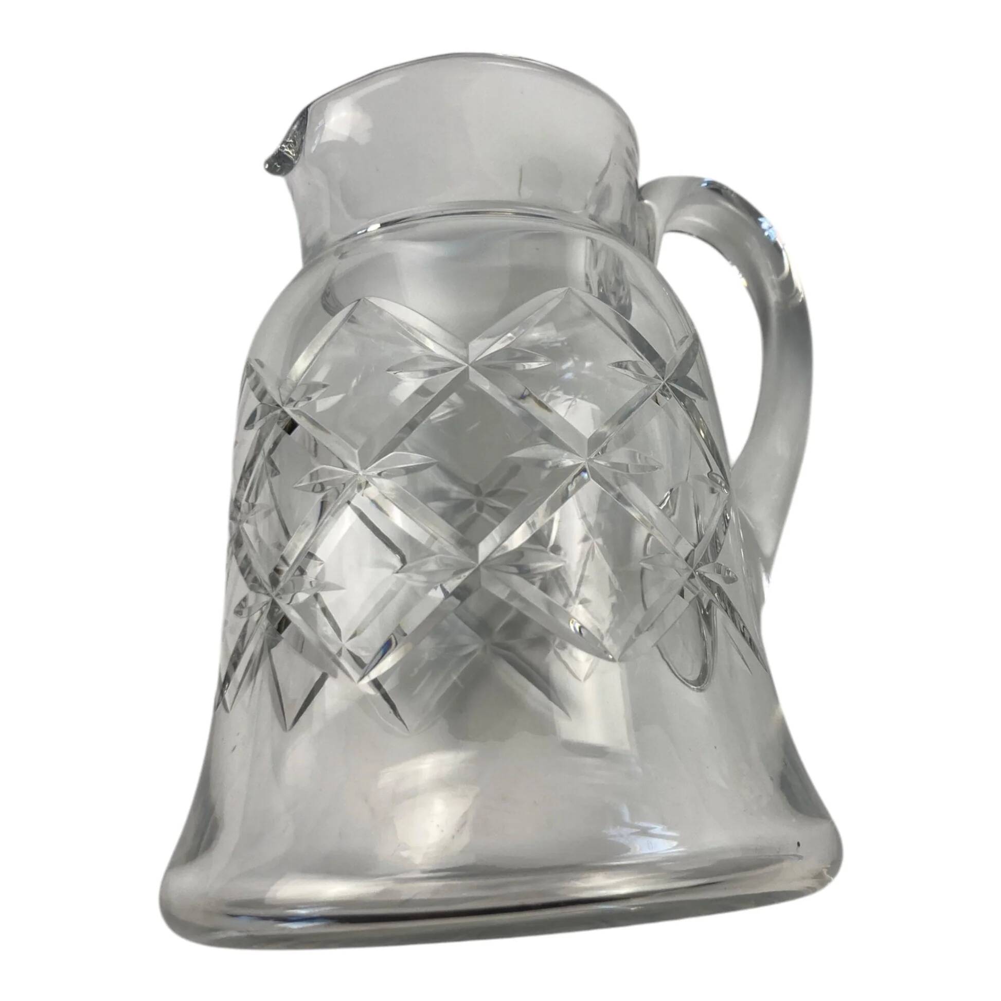 Antique Baccarat water jug in cut crystal with bevels.