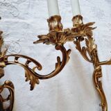 Pair of vintage French wall sconces in bronze, Louis XV Rococo style.