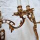 Pair of vintage French wall sconces in bronze, Louis XV Rococo style.
