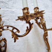 Pair of vintage French wall sconces in bronze, Louis XV Rococo style.